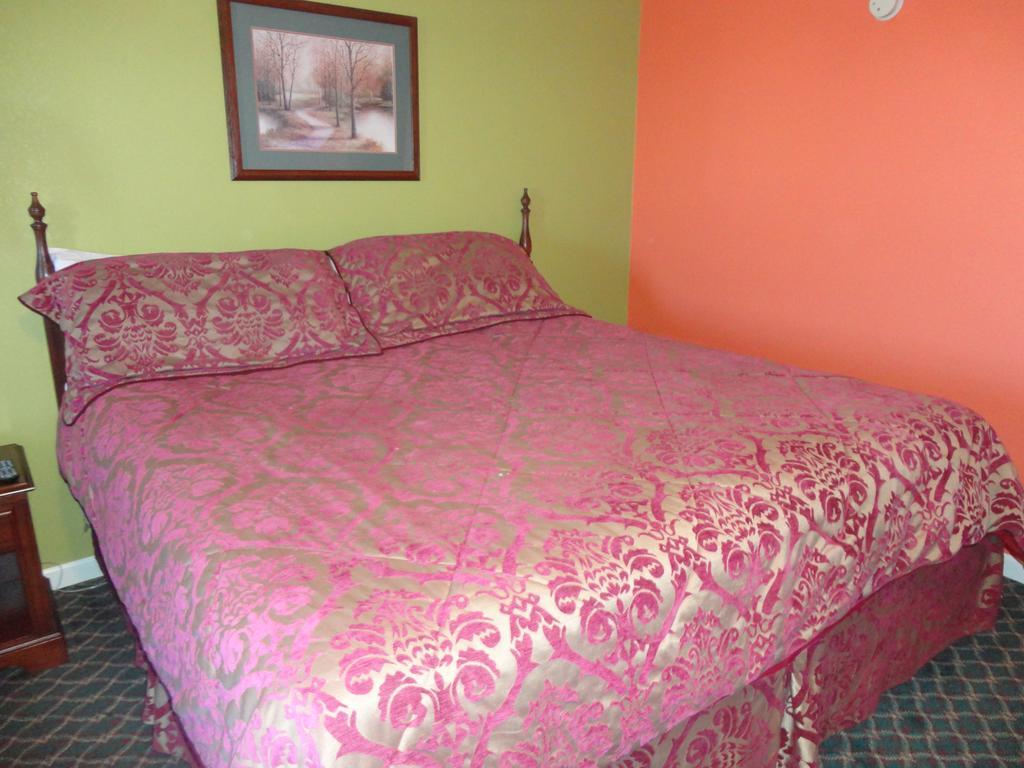 Royal Inn & Suites Туника Экстерьер фото